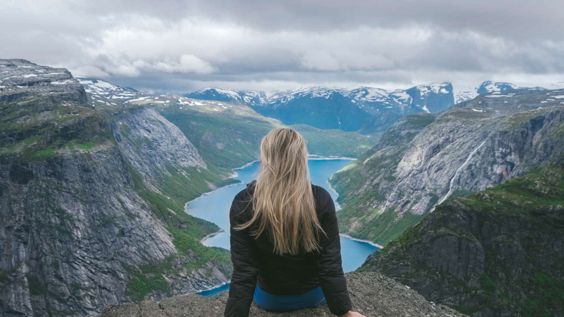 Mental Summit Woman Sitting on Top of Mountain